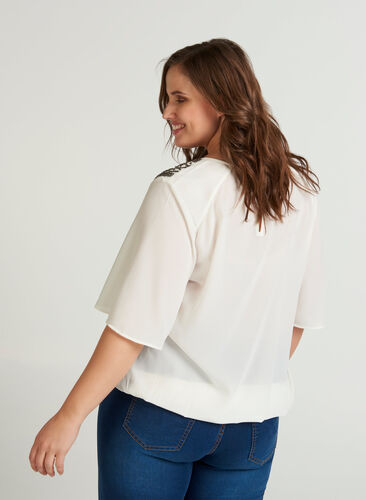 Short-sleeved blouse with decoration at the shoulders , Vanilla Ice, Model image number 1