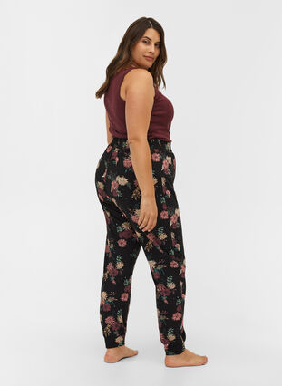 Printed pajama trousers in organic cotton, Black AOP Flower, Model image number 1