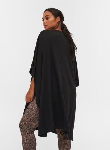 Plain poncho with buttons, Black, Model image number 1