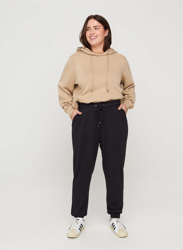 Sweatpants with pockets and drawstrings, Black, Model image number 0
