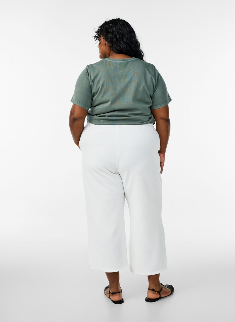 Loose trousers with 7/8 length, Beige, Model image number 1