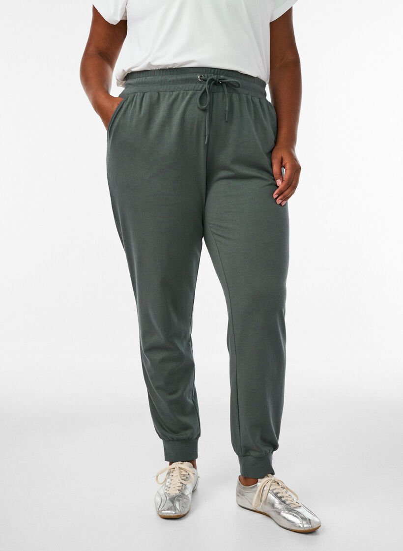 Loose tracksuit trousers with pockets, Green, Model image number 2
