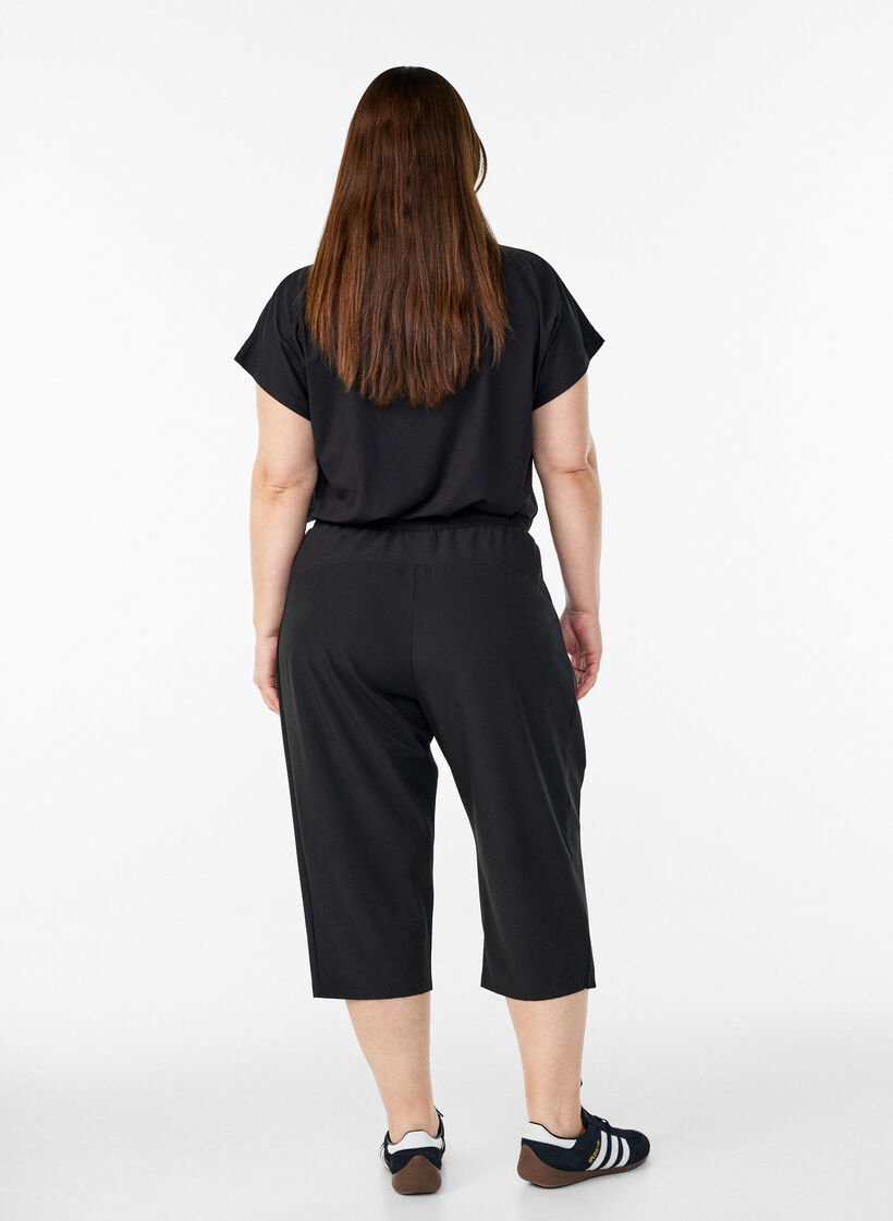 High-waisted capri training trousers, Black, Model image number 2