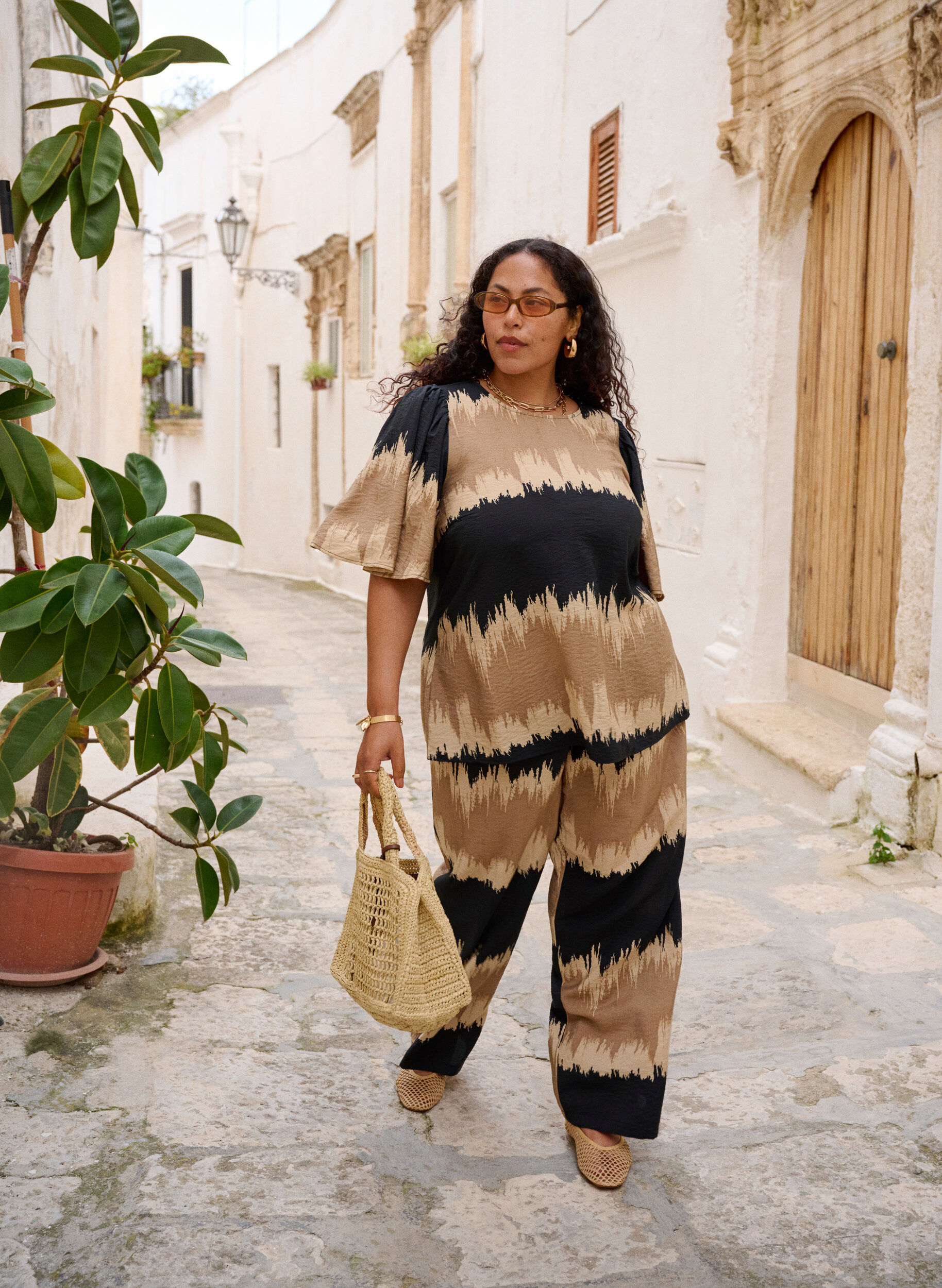 Zizzifashion Loose trousers with graphic print, Black, Image image number 0