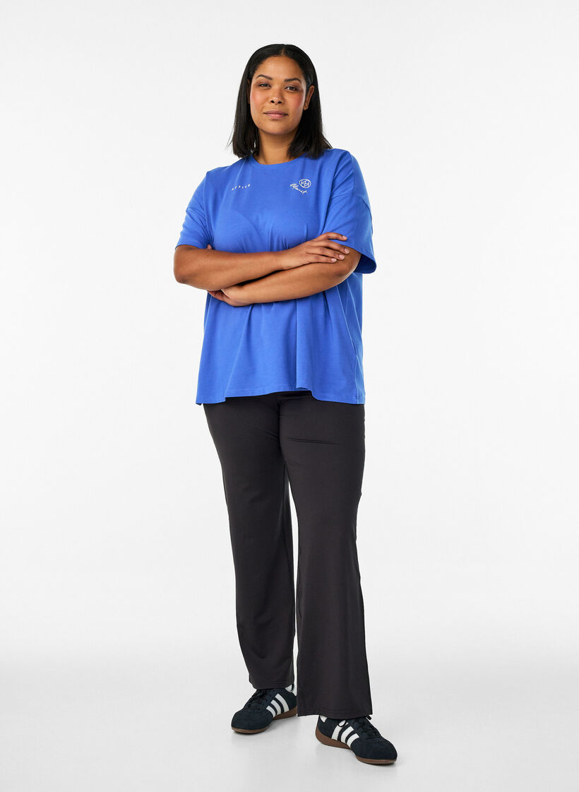 Flared training trousers with high waist, Black, Model image number 1