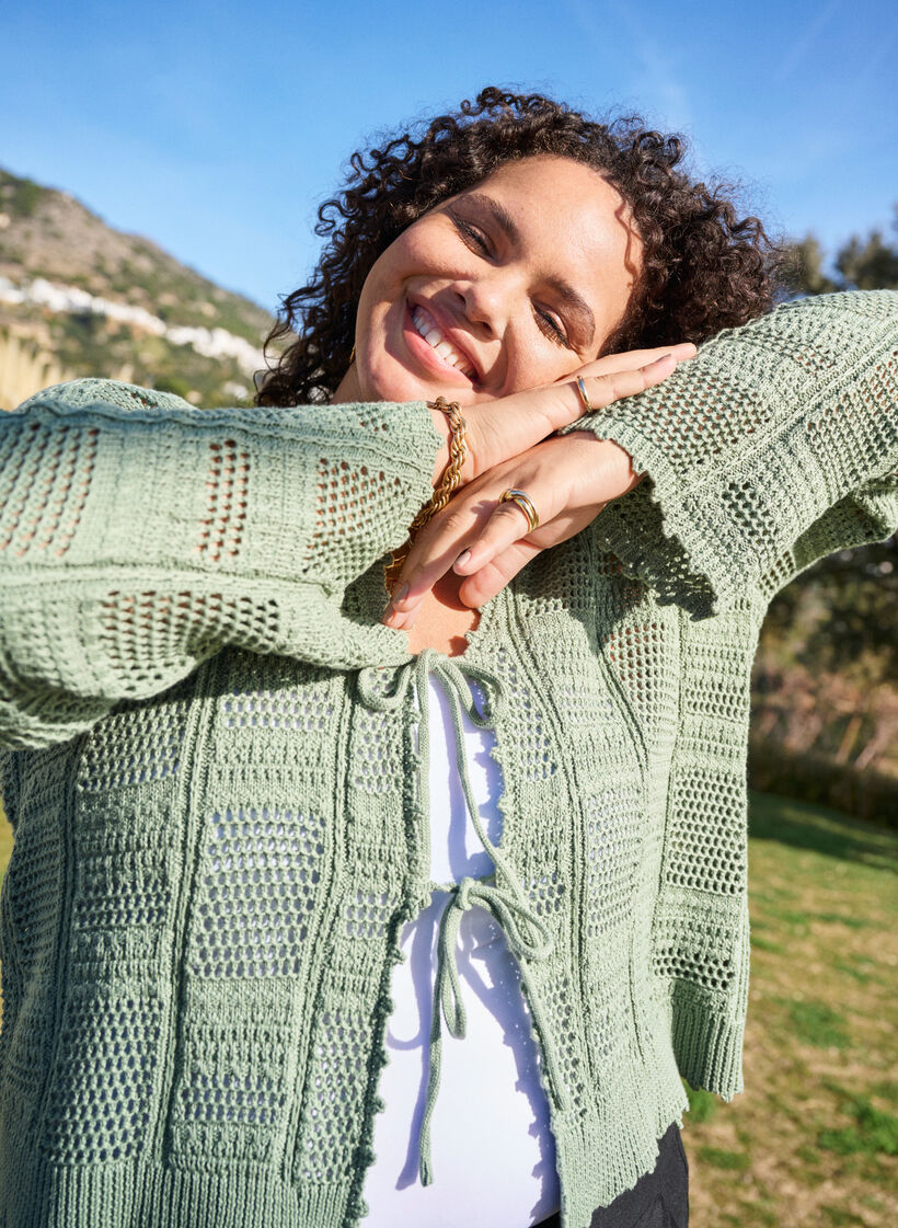 Knitted cardigan with ties and an openwork pattern, Green, Image image number 0