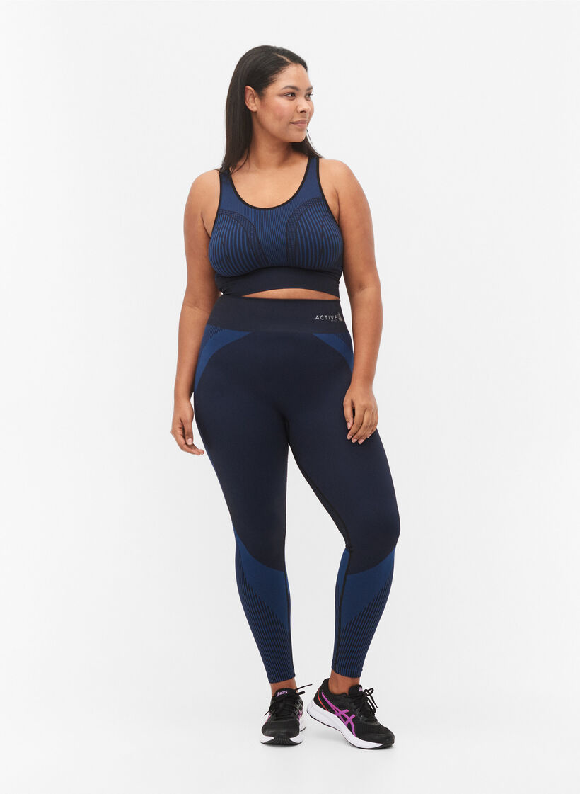 Seamless sports bra with stripes, Black w. Blue Depths, Model image number 2