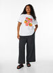 Loose trousers with high waist and pockets, Black, Model image number 1