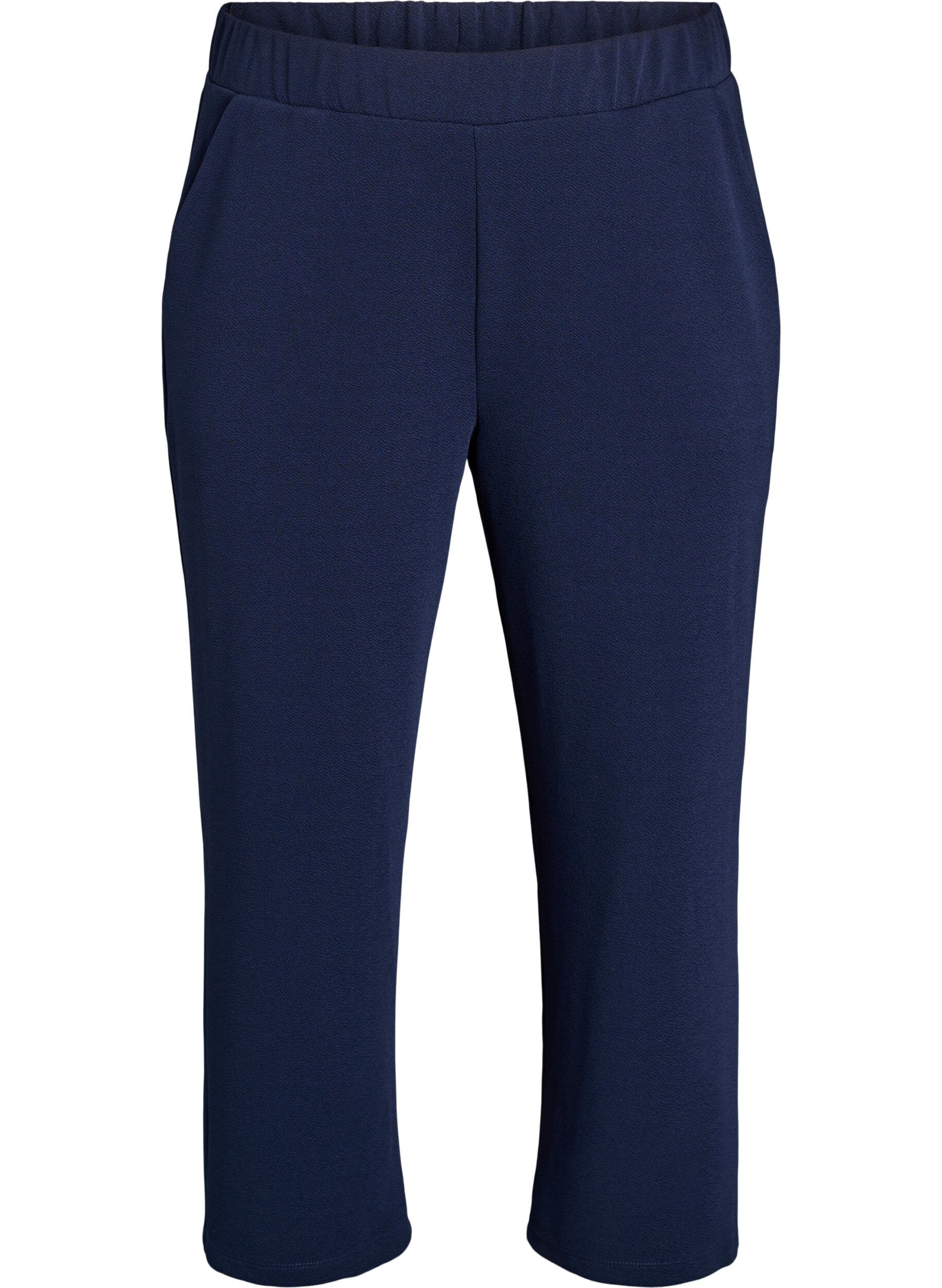Loose trousers with 7/8 length