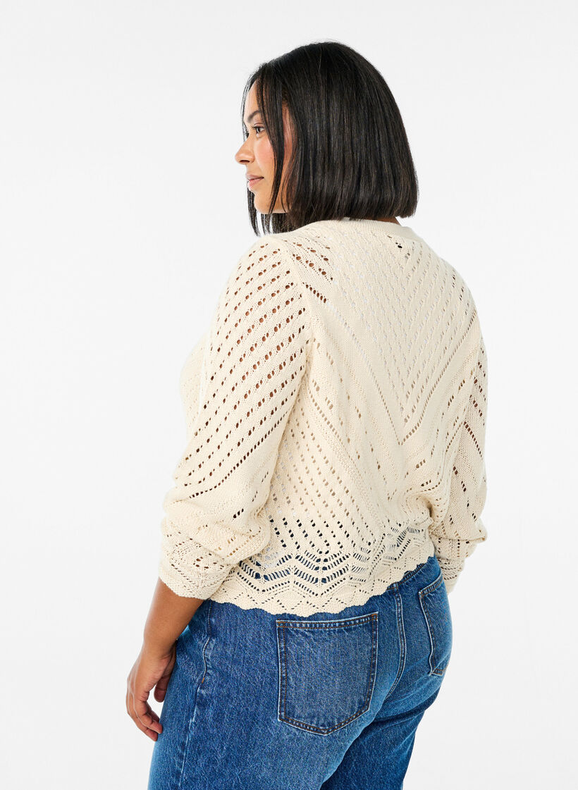 Short knitted cardigan with eyelet pattern, Sandshell, Model image number 1