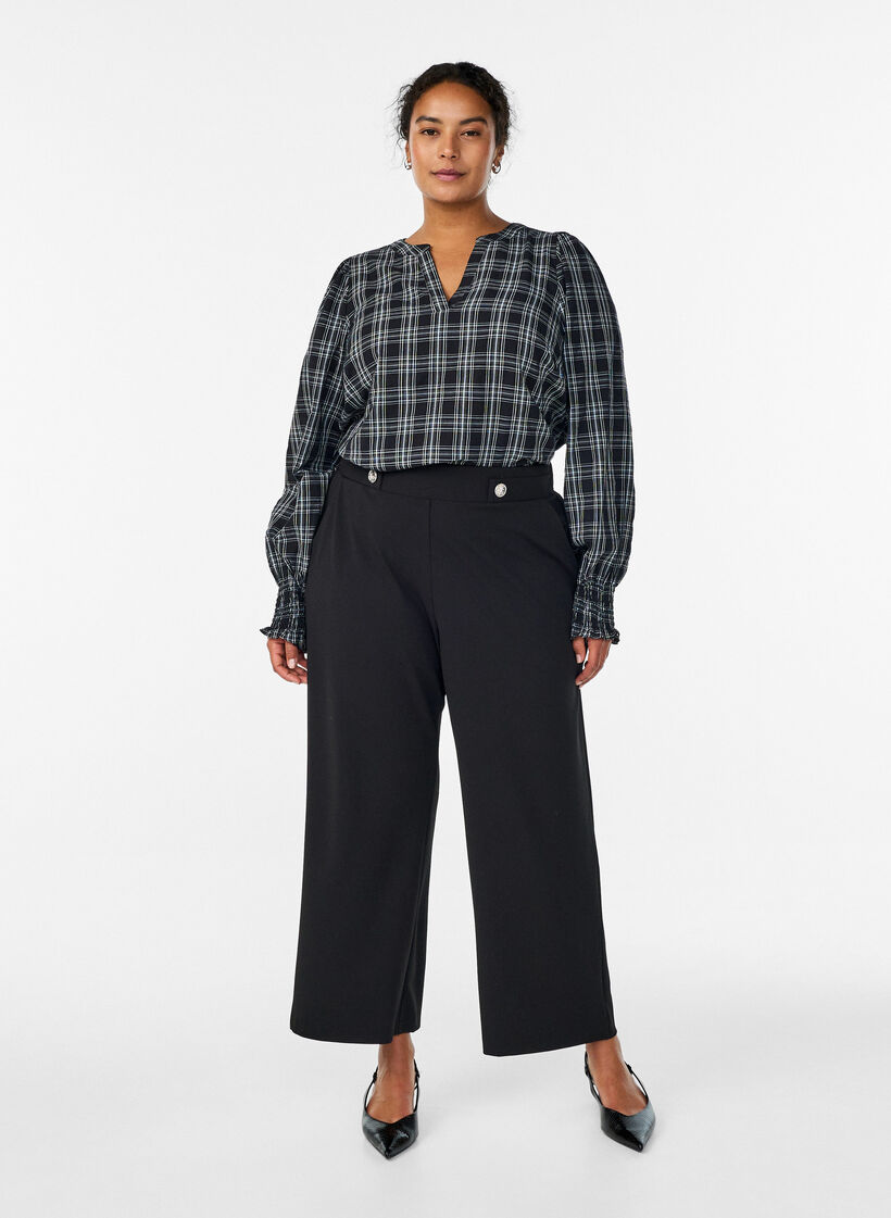 Loose trousers with pockets, Black, Model image number 0
