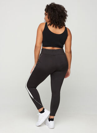 Cropped exercise tights with print details on the side, Black, Model image number 1