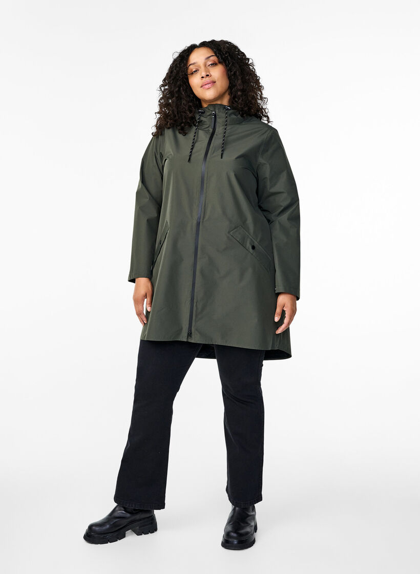 Rain jacket with pockets and hood, Green, Model image number 1