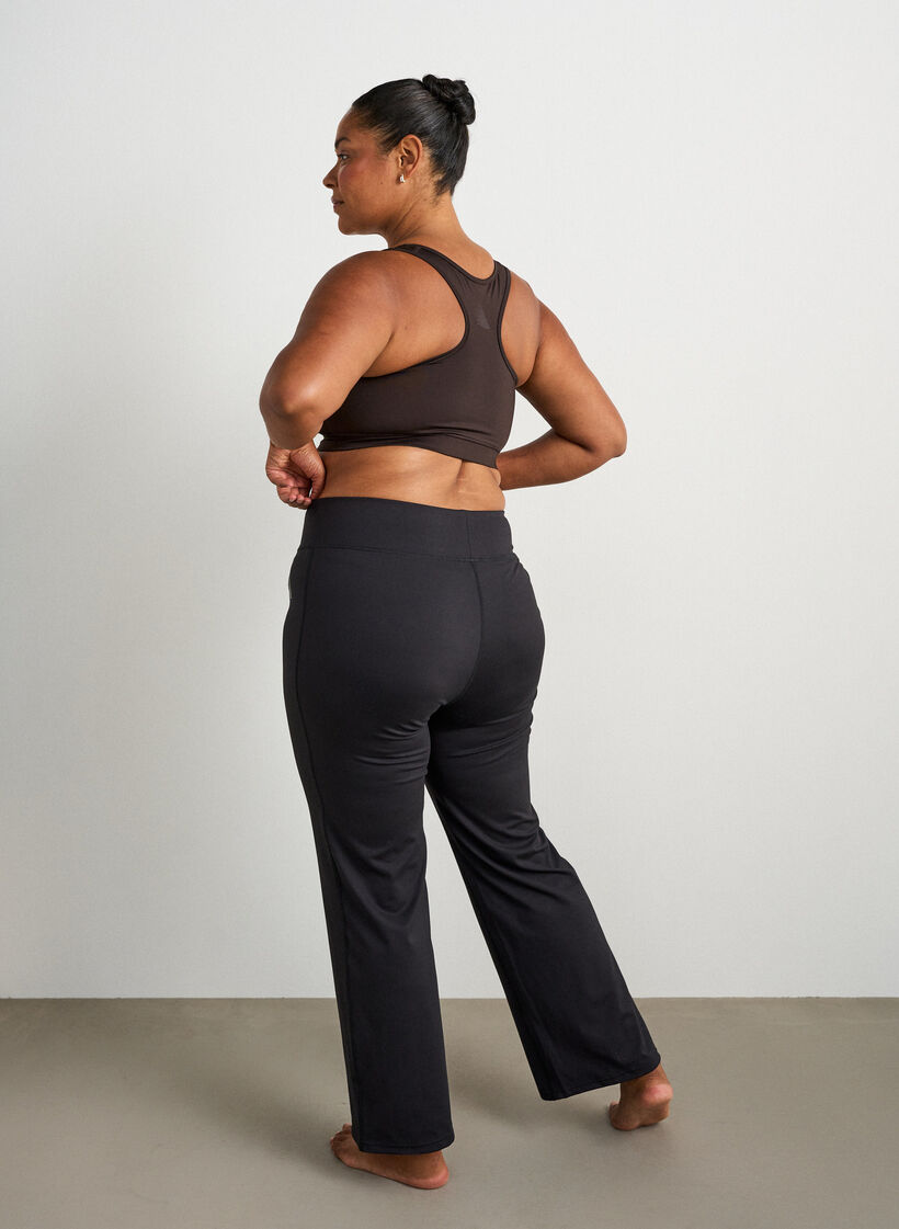 Bootcut training tights with a high waist, Black, Model image number 1