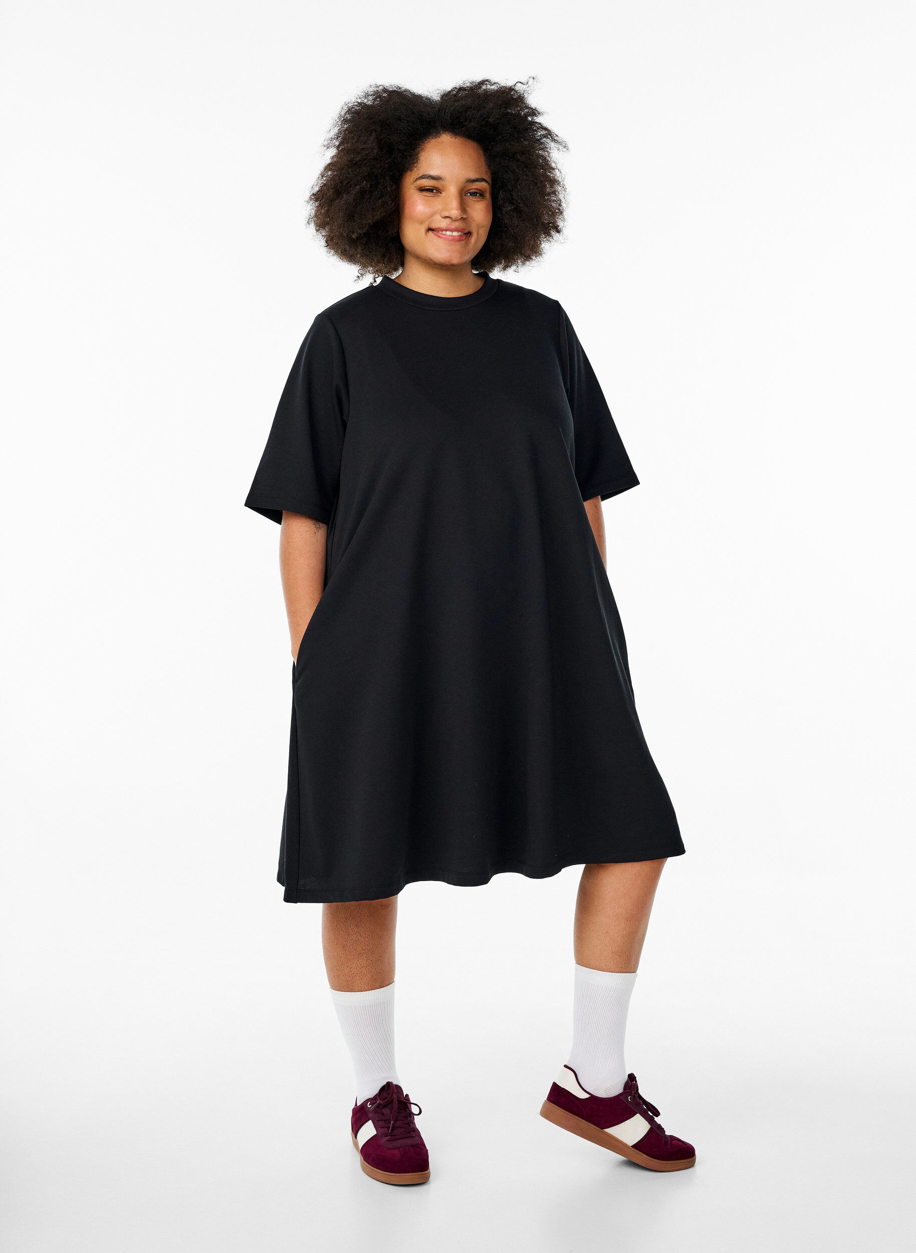 Knee-length jersey dress with pockets and A-line shape, Black, Model