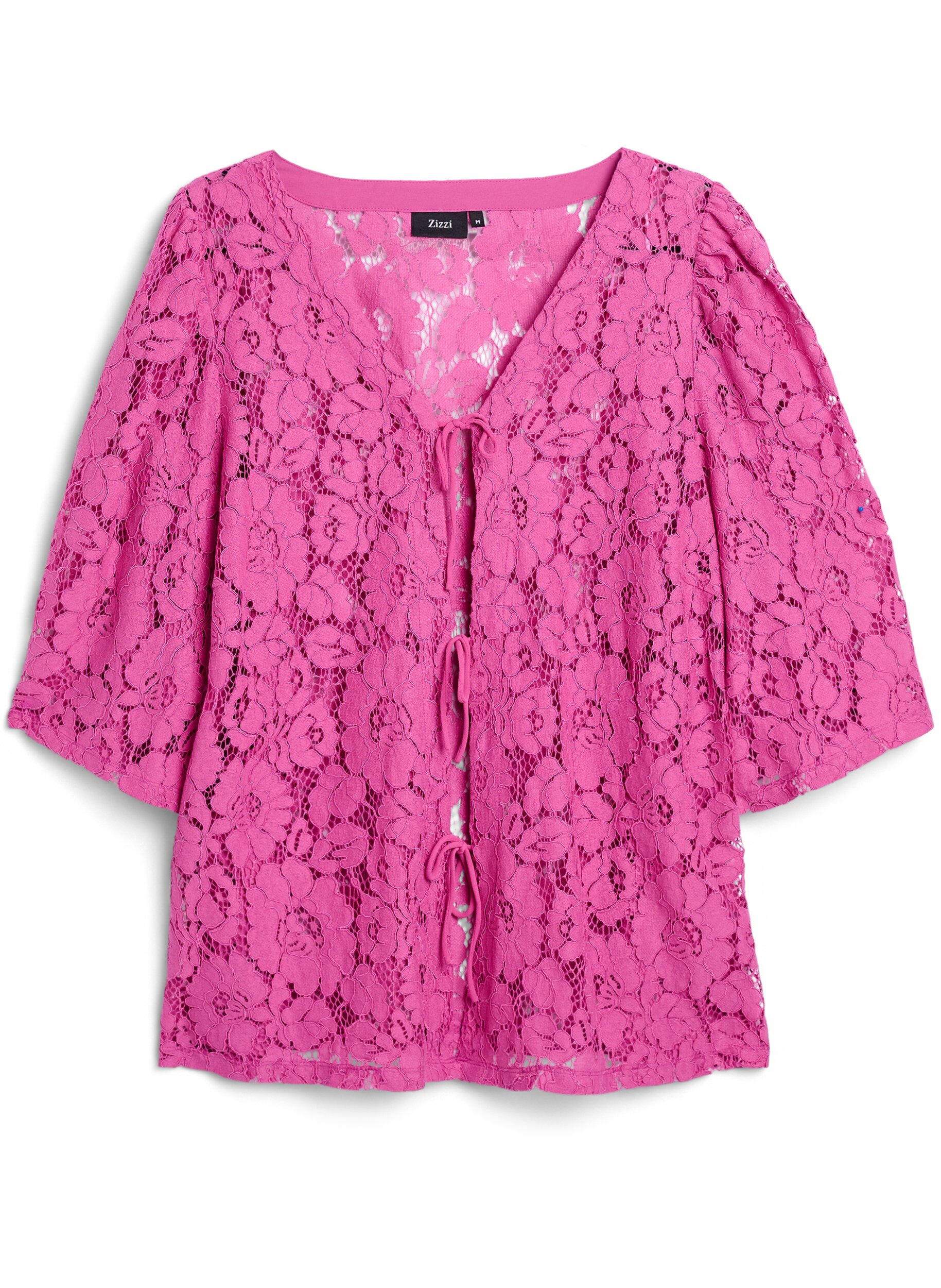 Lace blouse with 3/4 sleeves and bows on the front