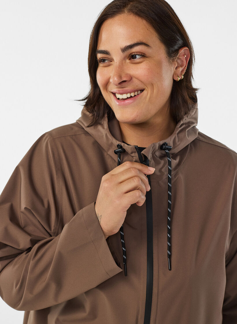 Rain jacket with pockets and hood, Brown, Model image number 3