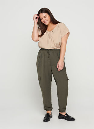 Loose trousers with large pockets, Black Olive, Model image number 0