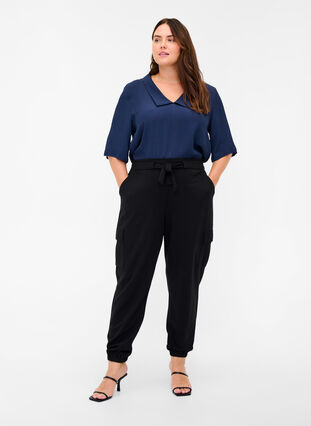 Cargo trousers with big pockets, Black, Model image number 0