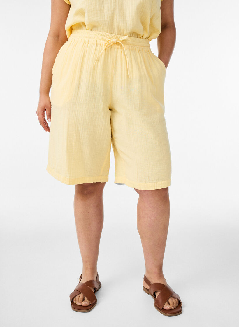 Loose cotton muslin shorts with a high waist, Yellow, Model image number 0