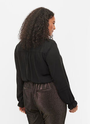 Top with long sleeves and button closure, Black, Model image number 1