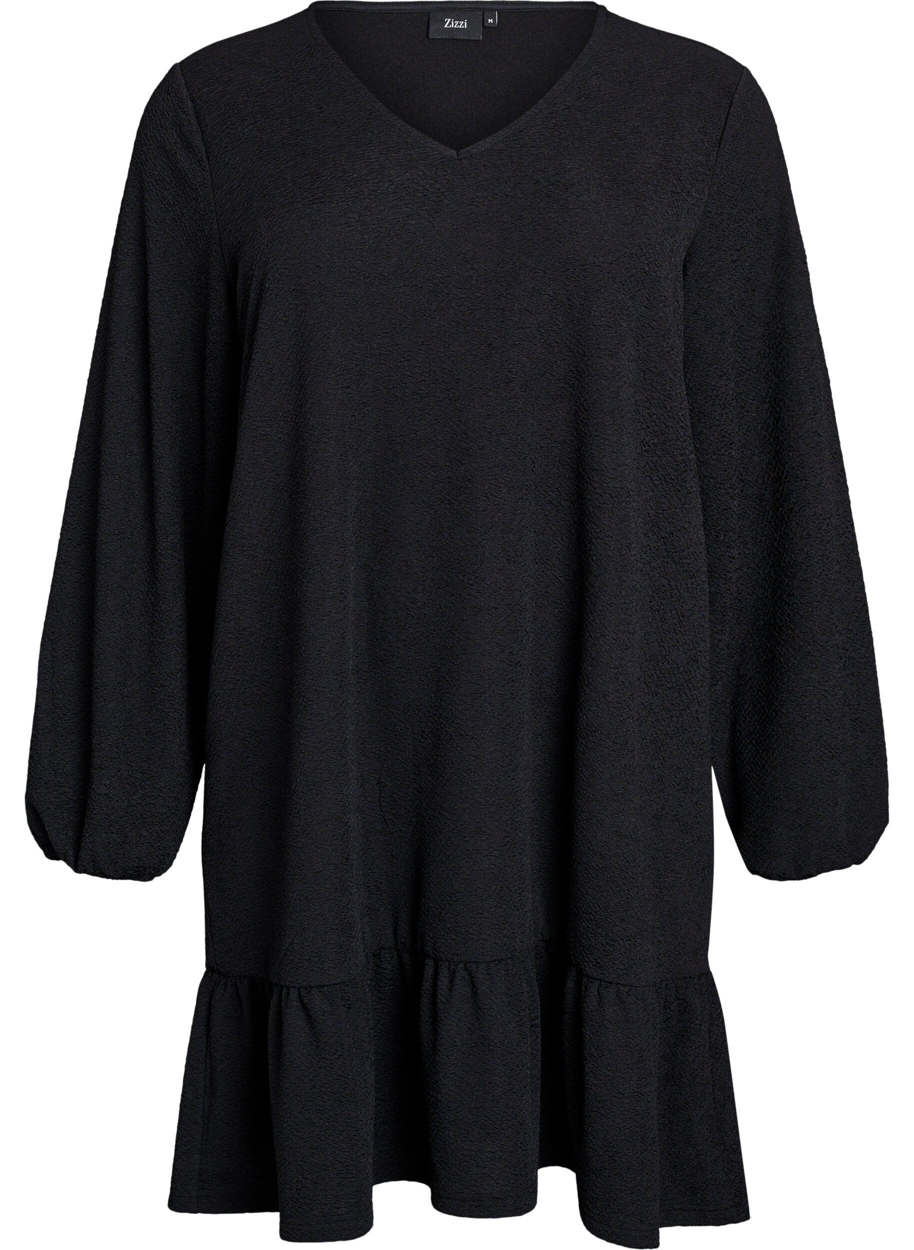 Short textured dress with a ruffle hem