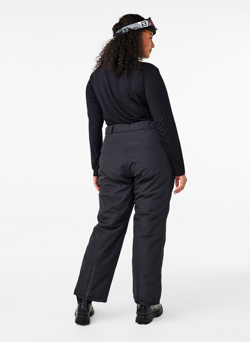 Ski trousers with pockets and adjustable waist, Black, Model image number 1