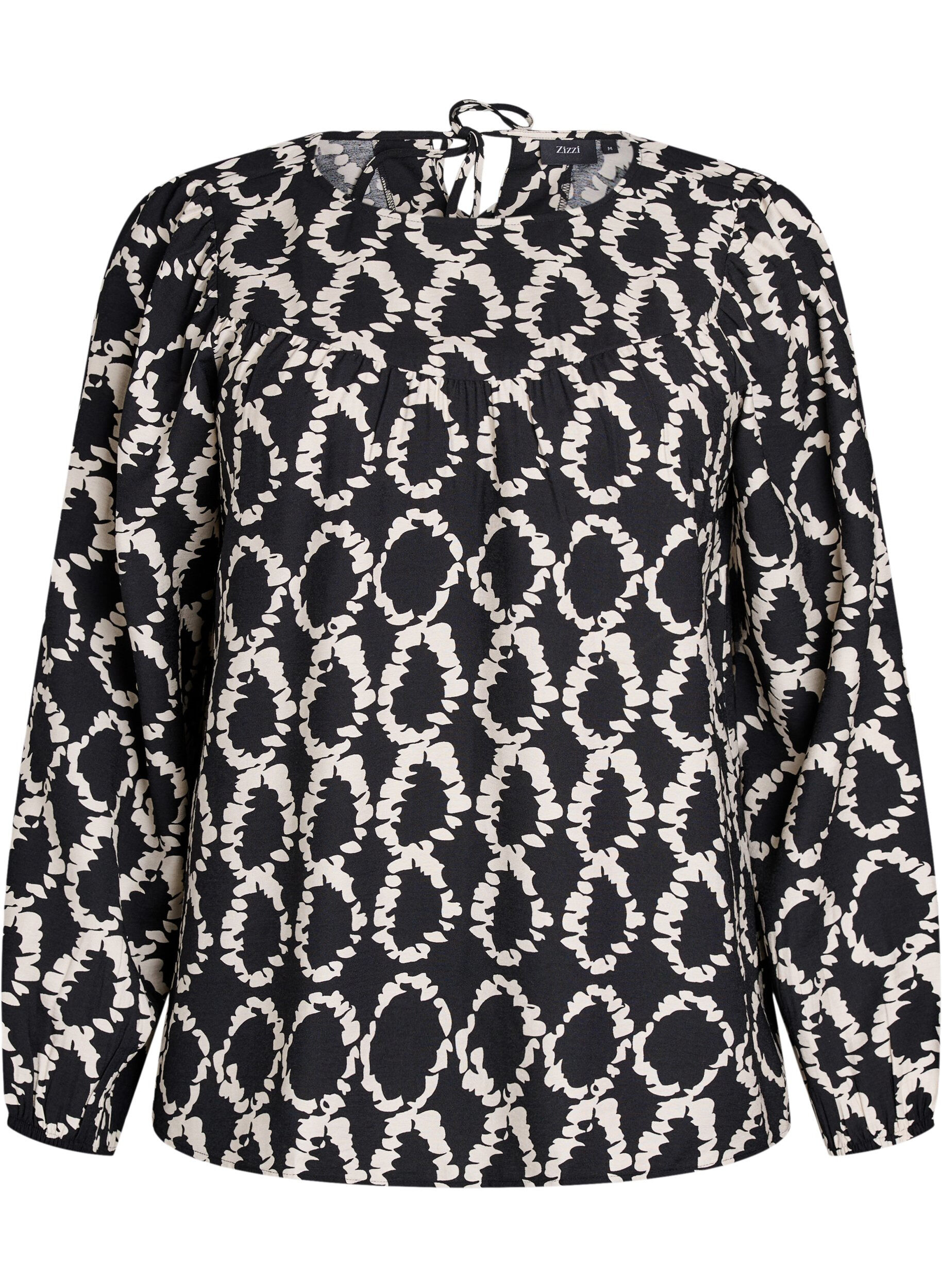 Long-sleeved blouse with print and bows