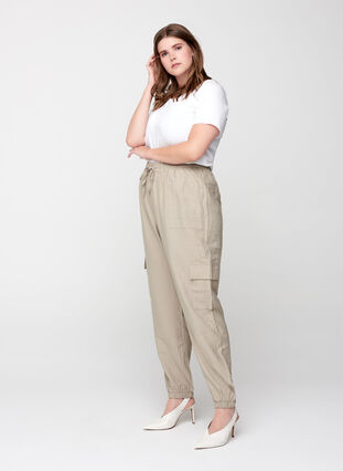 Loose trousers with side pockets, Tuffet, Model image number 0