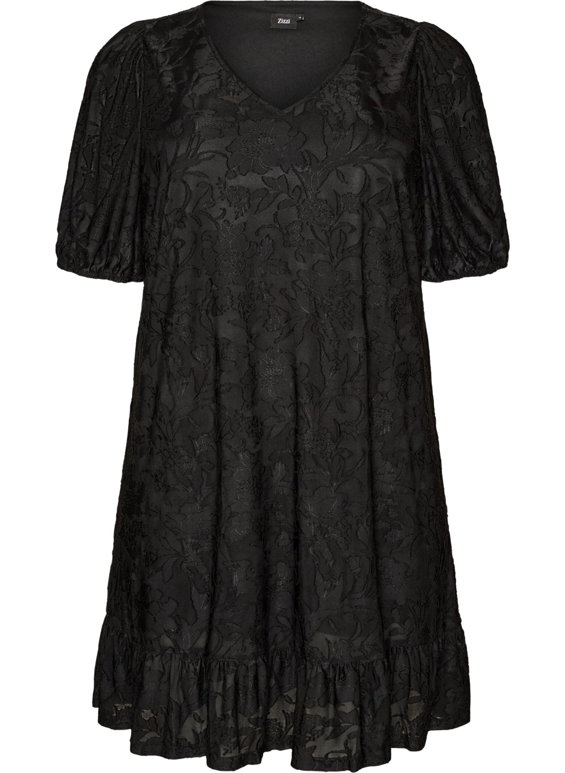Dress with floral texture and ruffle trim