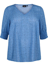 Dotted blouse with short sleeves