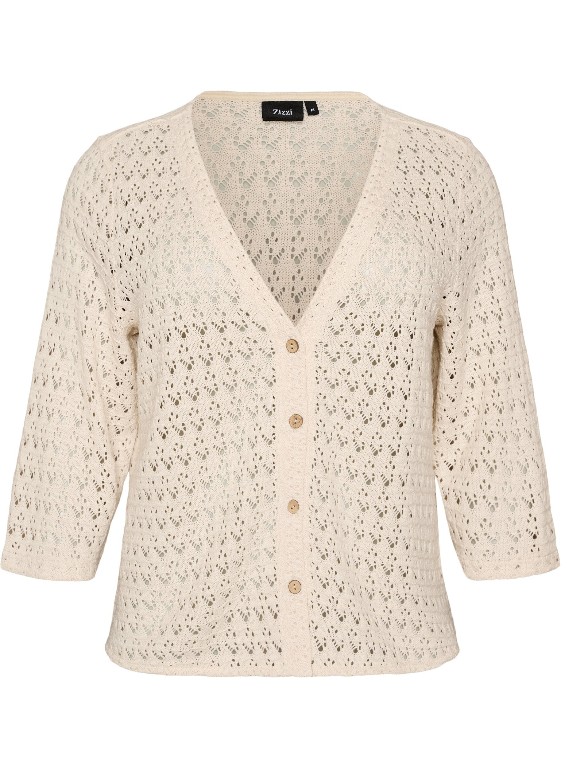 Knitted cardigan with eyelet embroidery and a V-neck