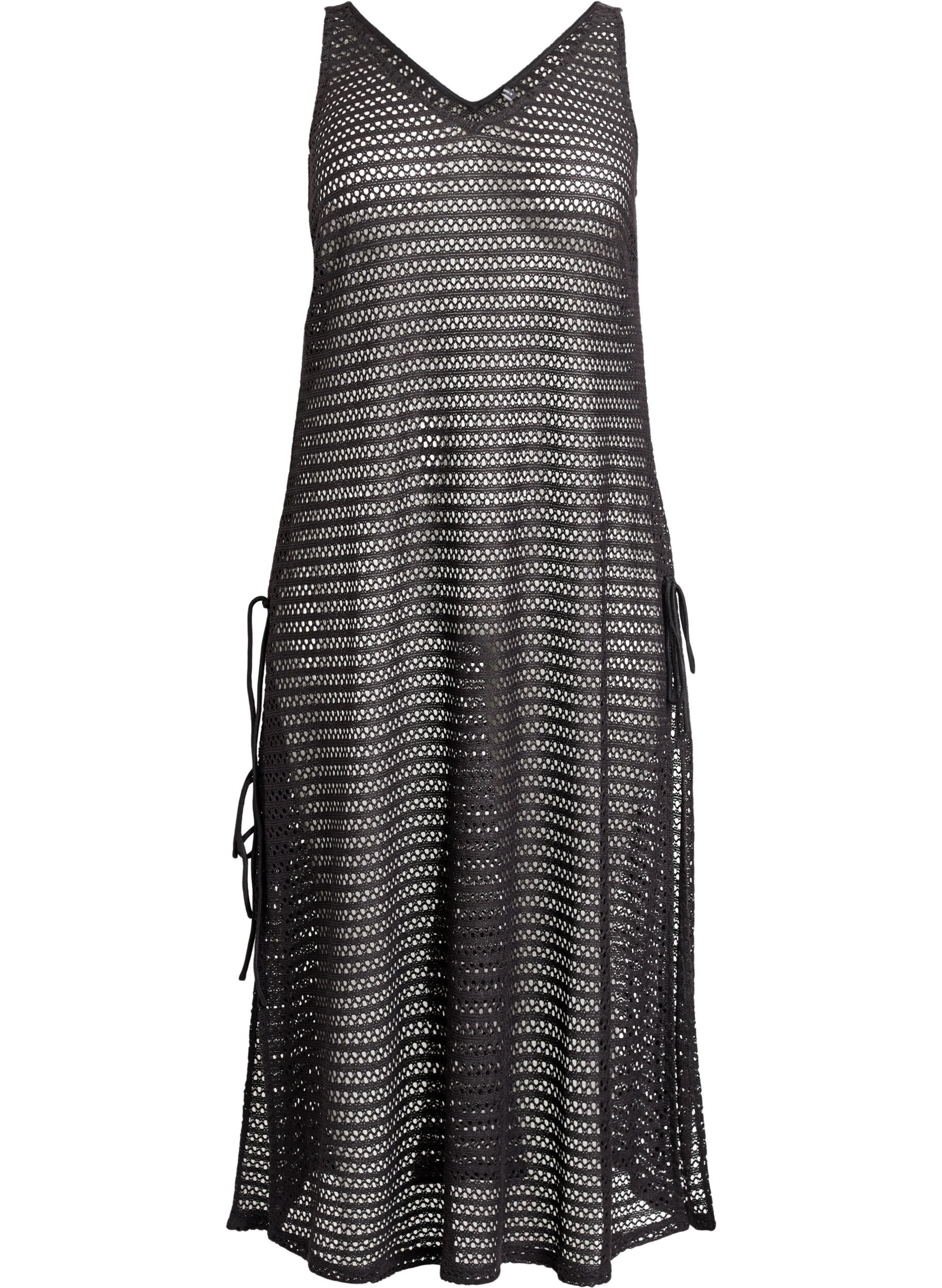 Sleeveless beach dress with eyelet embroidery and side slits