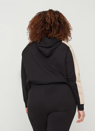 Sweatshirt with a hood and pocket, Black, Model image number 1