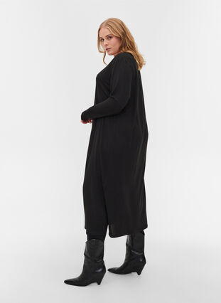Plain dress with long sleeves and slit, Black, Model image number 1