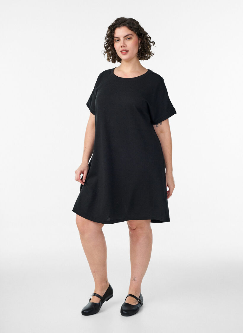 Short textured jersey dress with a round neck, Black, Model image number 1