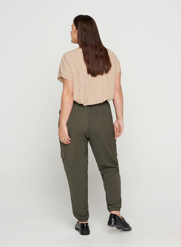 Loose trousers with large pockets, Black Olive, Model image number 1