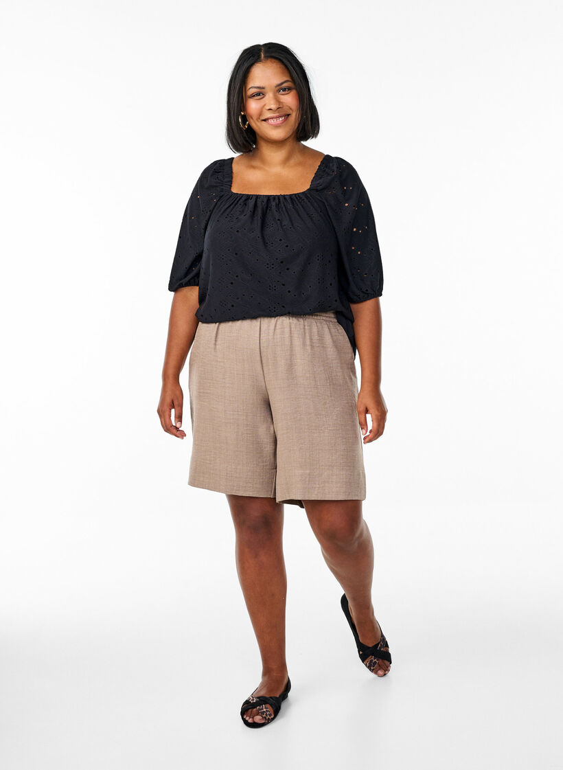 Blouse with short puff sleeves and an openwork pattern, Black, Model image number 1