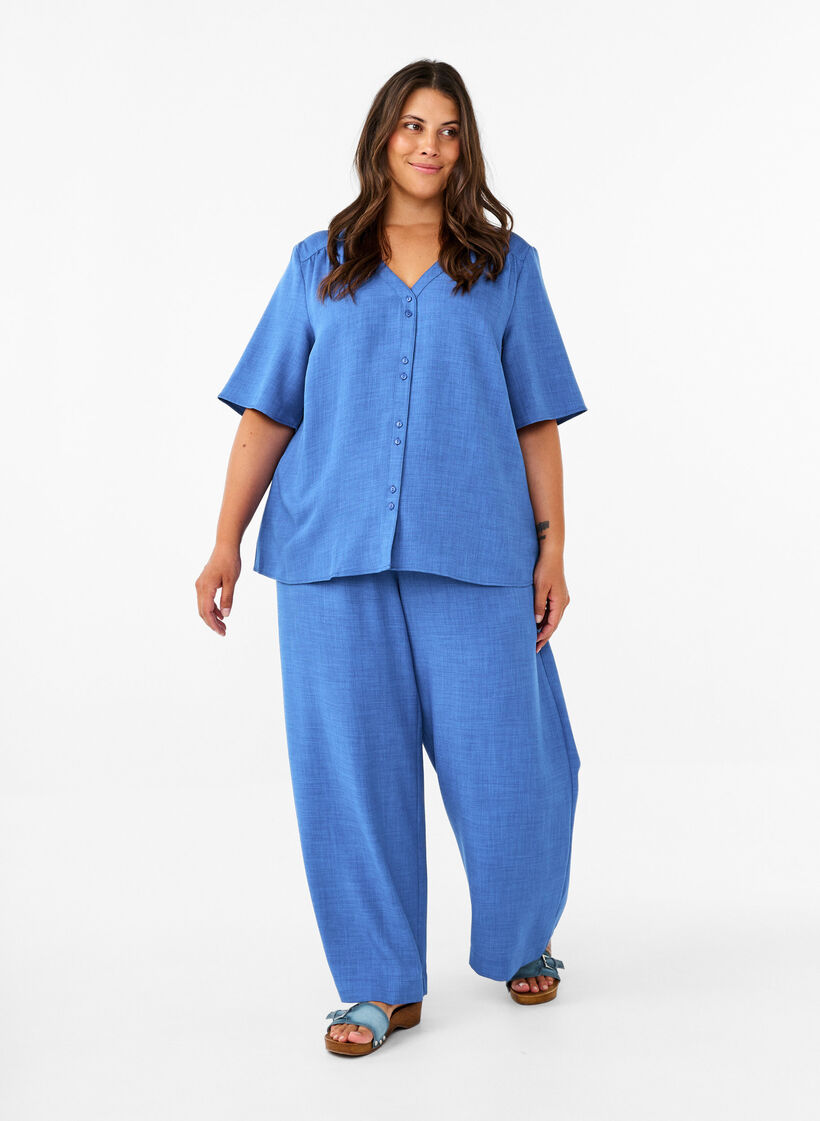 Loose trousers with elasticated waistband and pockets, Blue, Model image number 0