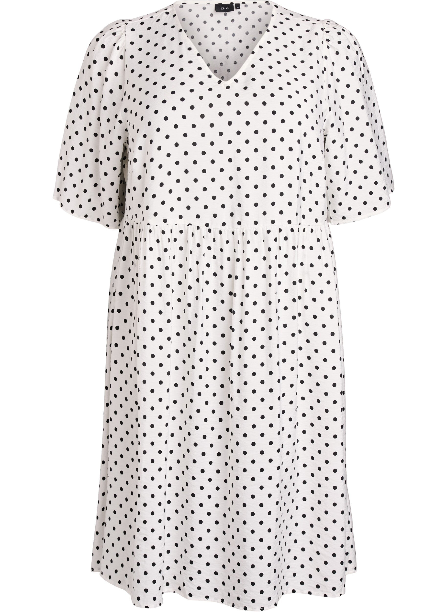 Dotted dress with V-neckline and A-line shape