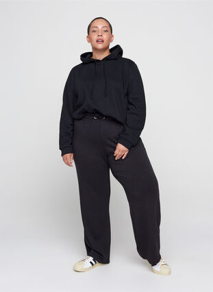 Wide sweatpants with drawstrings in the waist, Black, Model image number 0