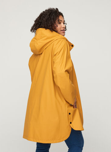 Rain coat with a hood and pockets, Spruce Yellow, Model image number 1