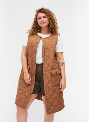 Long quilted vest with button closure and pockets, Rubber, Model image number 0