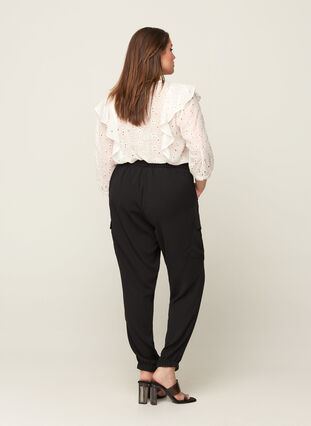 Loose trousers with side pockets, Black, Model image number 1
