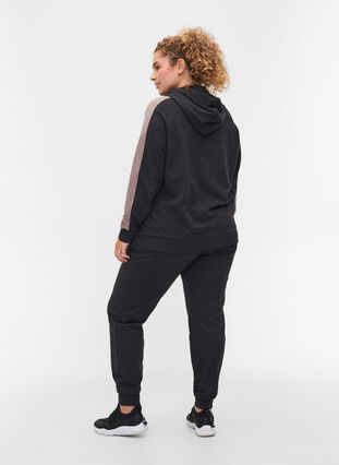 Loose sweatpants with pockets, Black, Model image number 1