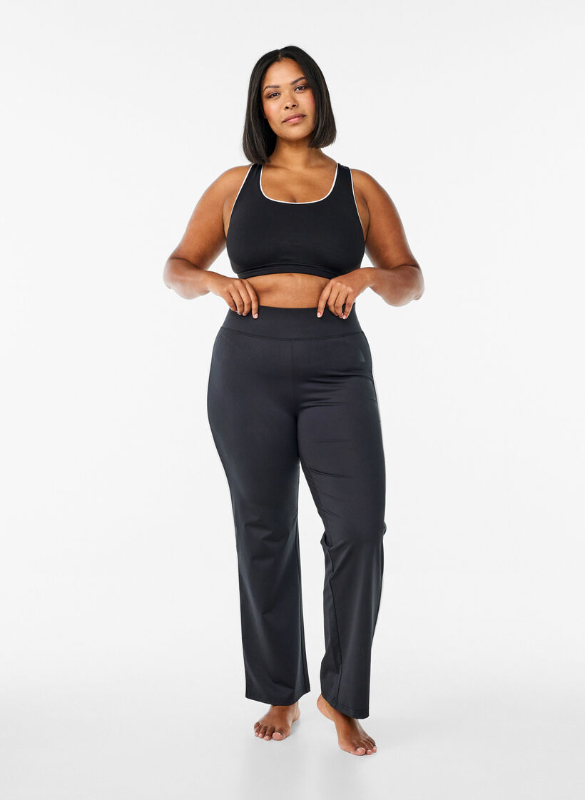 Racerback sports bra with contrast piping, Black, Model image number 1