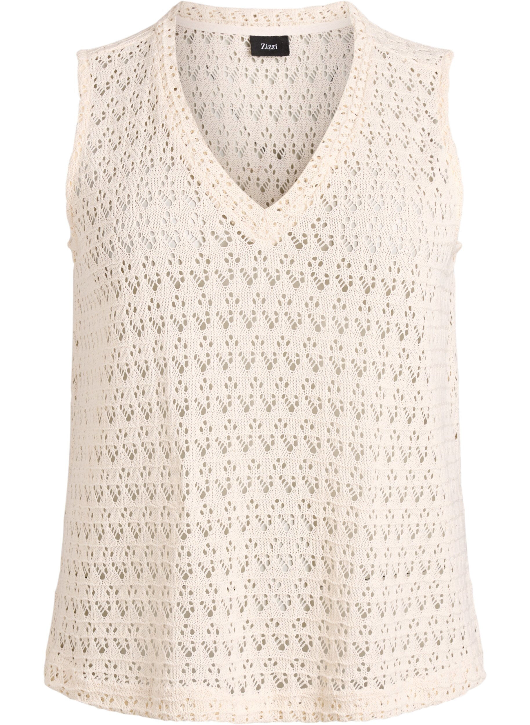 Sleeveless blouse with eyelet embroidery and V-neck
