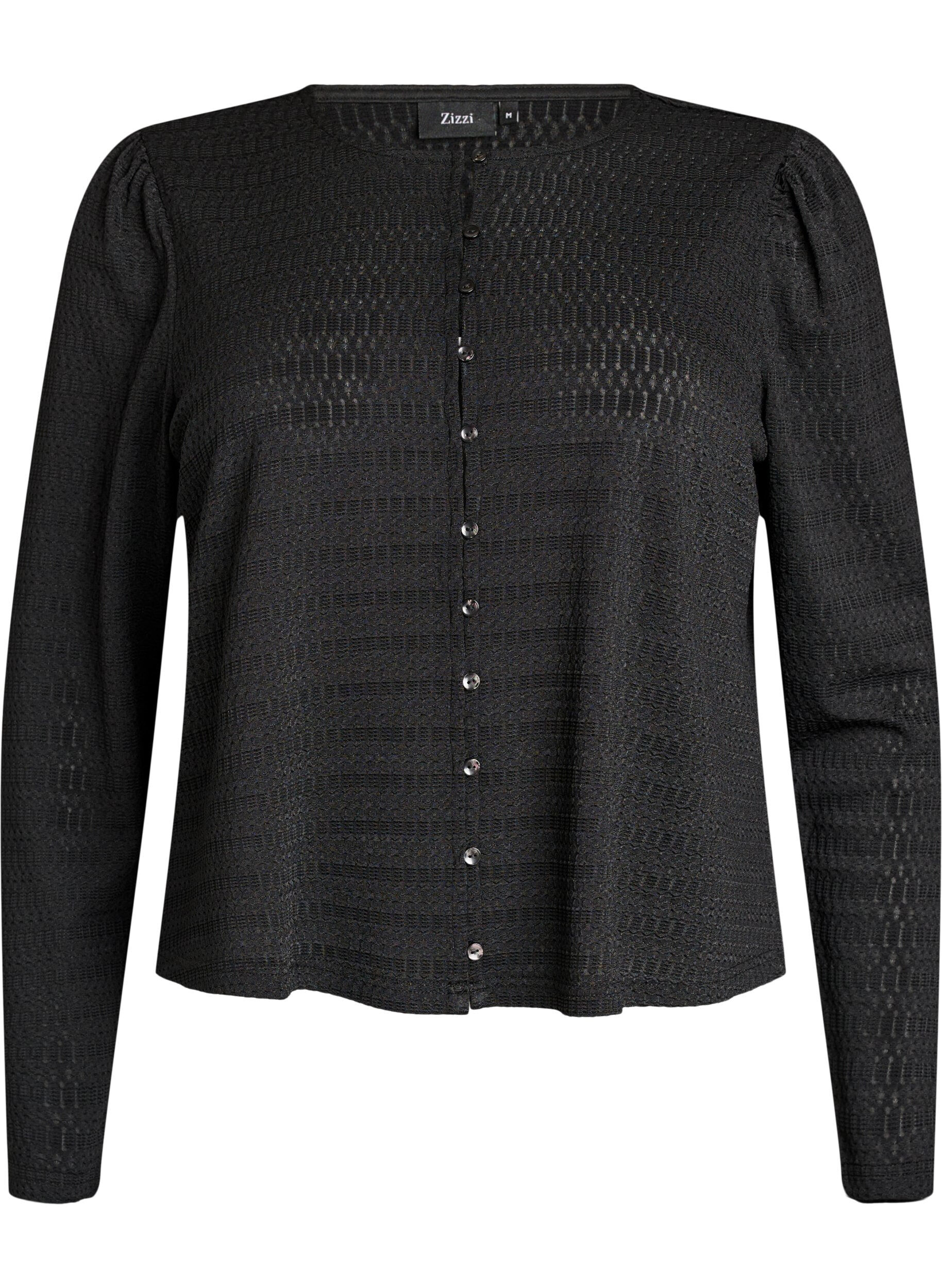 Blouse with textured pattern and button fastening