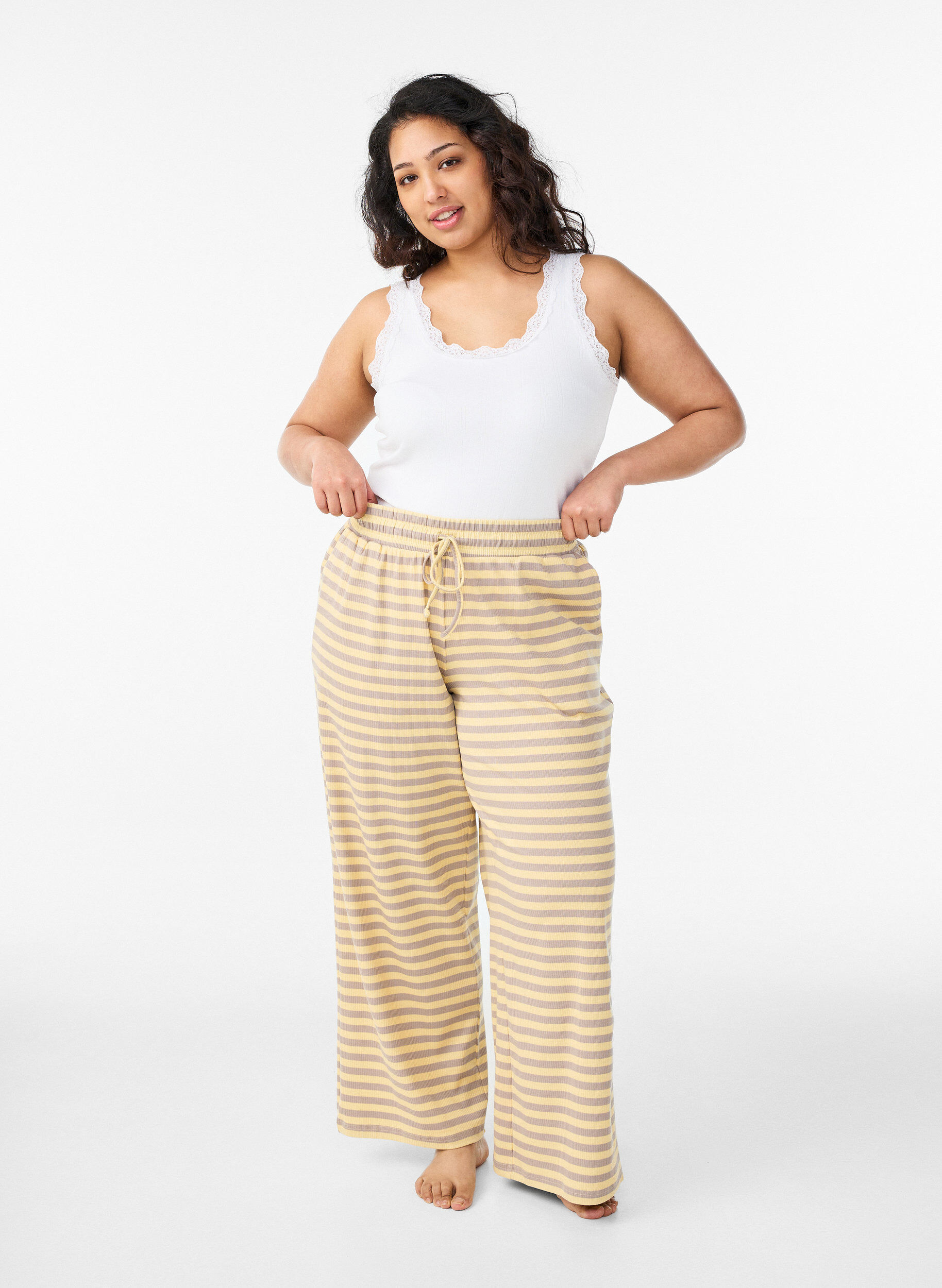 Zizzifashion Striped pyjama bottoms with a high waist and wide legs, Yellow, Model image number 0