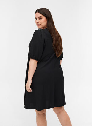 Dress with puff sleeves and V-neck, Black, Model image number 1